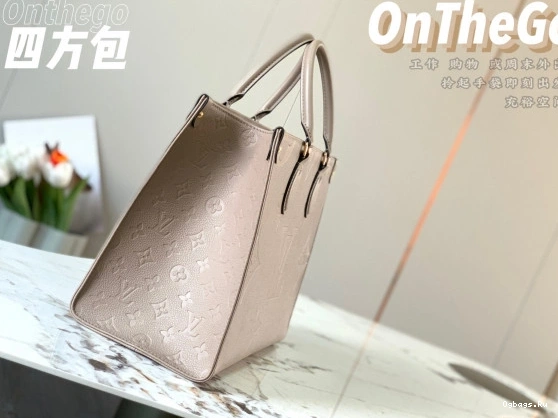 VUITTON ONTHEGO LOUIS MM 0409